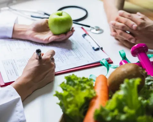 Doctor performing a nutrition assessment