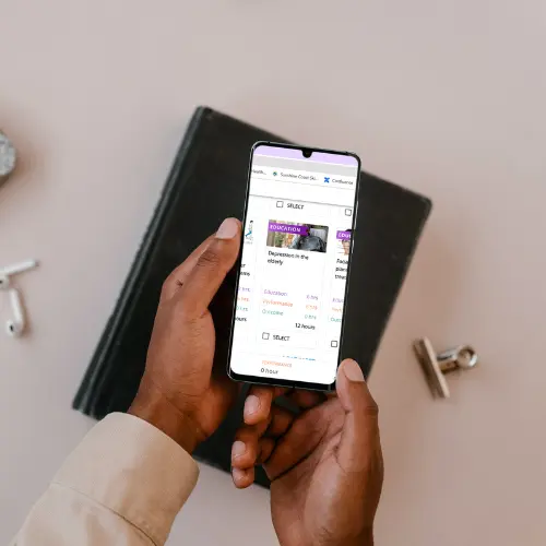Doctor using HealthCert 365 on their phone Doctor using HealthCert 365 on their phone