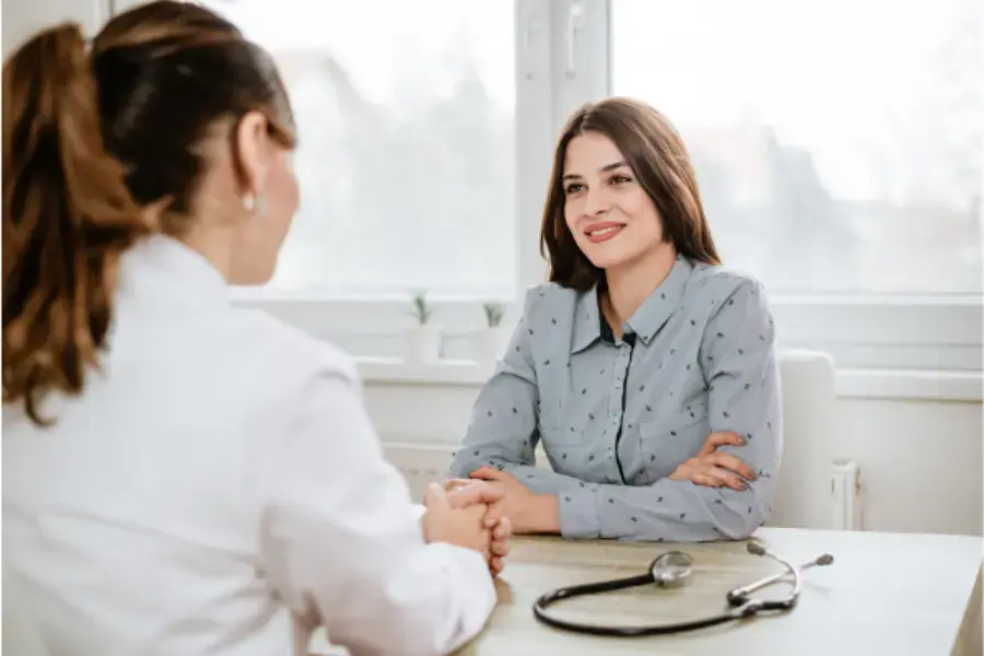 Woman talking to a doctor